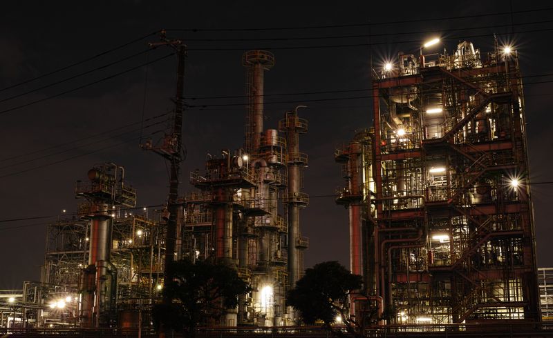 Industrial manufacturing facility with process equipment and storage tanks